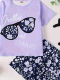 A Young Girl's Glasses And Fashionable T-Shirt Paired With A Floral Print Short Skirt Set, A Summer Trendy Children's Fashion Ou