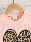 A summer fashion 2-piece set for girls featuring a new heart-shaped round-neck printed top and solid-color casual pants